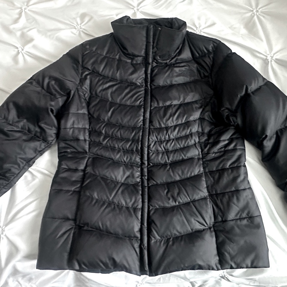 Black goose down puffer jacket from The North Face